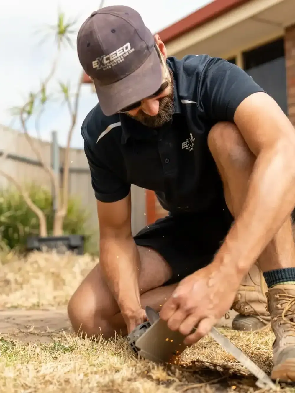 A Elizabeth Grove plumber at work on a job